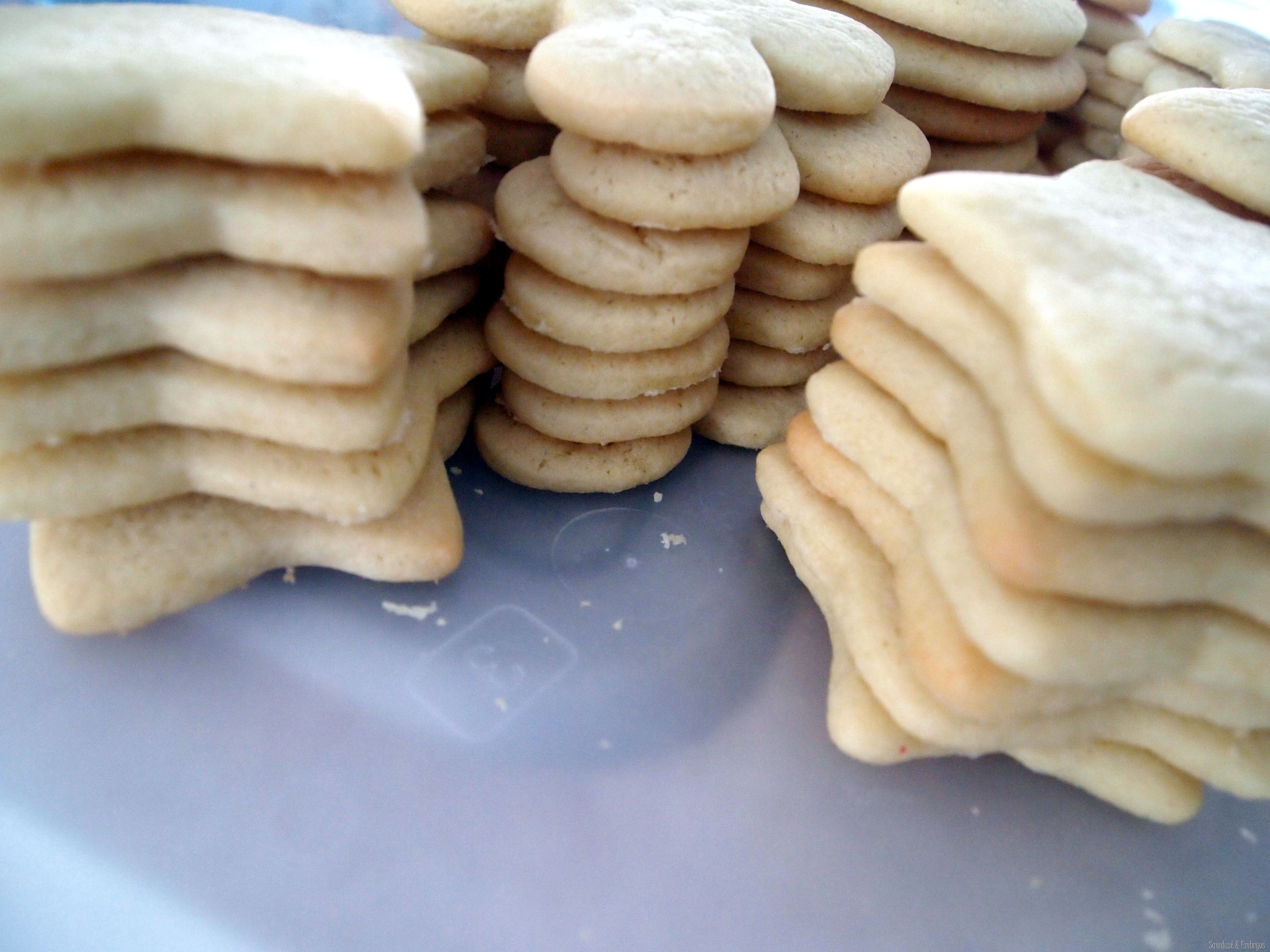 Soft Cut Out Sugar Cookies For Decorating Frosted cut out sugar cookies shaped like trees, mittens, snowflakes and candy canes in pastel icing with sprinkles on marble