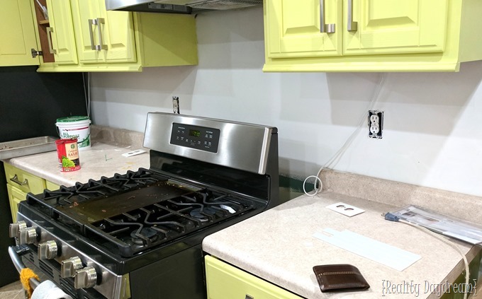 Preparing the backsplash to install glass subway tiles from Aspect {Reality Daydream}