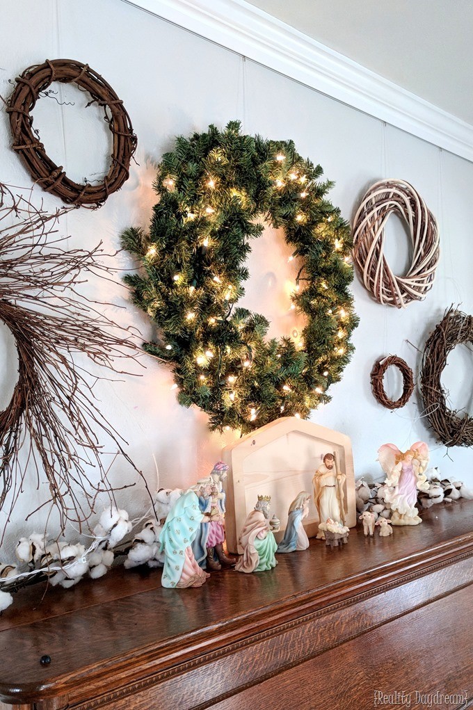 Holiday Gallery Wall and piano styled for Christmas with wreaths and nativity {Reality Daydream}