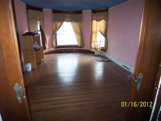 Old interior picture of one of the living areas in the Newton Carmean House