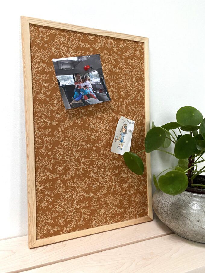 These fabric covered bulletin boards are such a great way to display pictures, notes, etc!